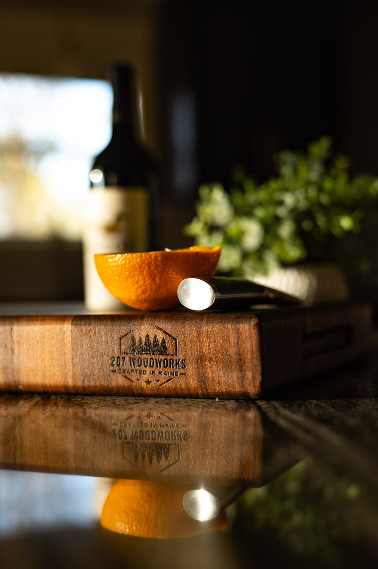Handcrafted walnut end-grain cutting board by 207 Woodworks, made in Maine.