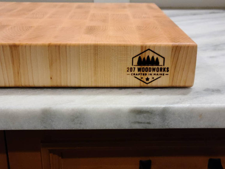 Handcrafted hard maple end-grain cutting board by 207 Woodworks, made in Maine.